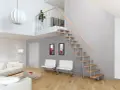 Nowe piętro ma 10 schodów. W salonie biała kanapa, szklany stolik i obrazy z Londynu.